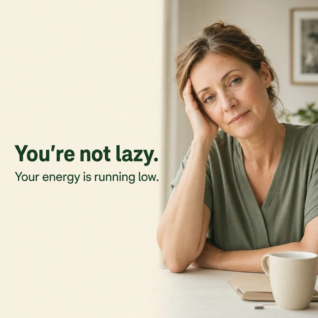 Woman resting her head at a kitchen table, text: You're not lazy, your energy is running low